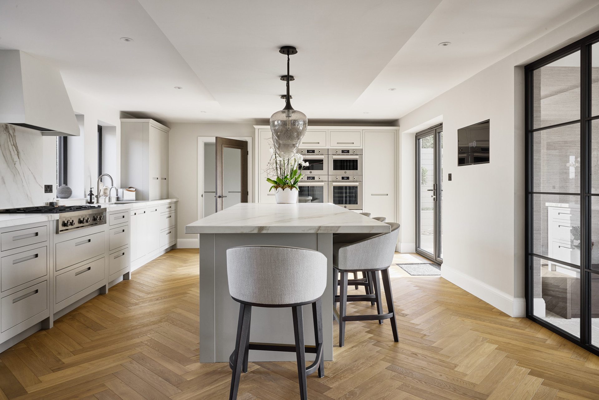 A Timeless Slab Outline Kitchen in Taupe Grey
