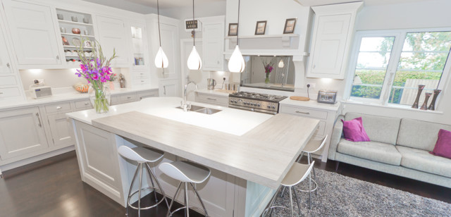 The clients wanted a light and open feel for their new kitchen and the classic 1909 range, in a simple in-frame Shaker style with quarter-round beading